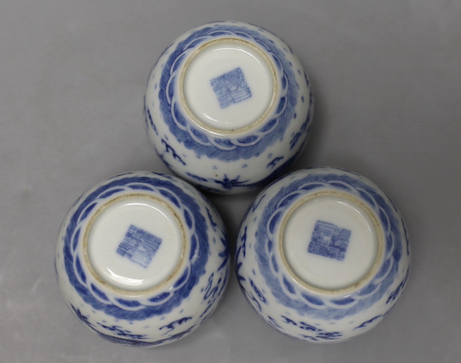 Three Chinese blue and white 'dragon and phoenix' waterpots, probably Republic period, 6cm